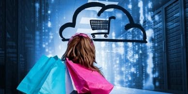 A woman sitting in front of a cloud with shopping bags.